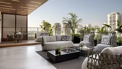 EcoSmart Fire Manhattan 50 Fire Table creates a modern centrepiece in YSM House with a sleek indoor ethanol fireplace installation.