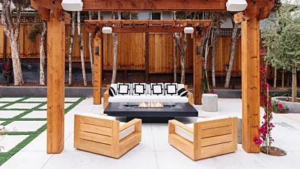 EcoSmart Fire Gin 90 Low Fire Table elevates outdoor living at a private residence featuring a sleek gas fire table for modern ambience.