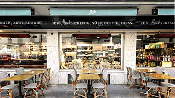 Heatscope Vision 3200W Radiant Heater provides discreet ceiling-mounted infrared warmth for an indoor restaurant dining space.