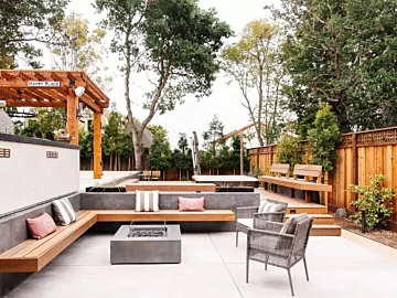 EcoSmart Fire Gin 90 Low Fire Table elevates outdoor living at a private residence featuring a sleek gas fire table for modern ambience.